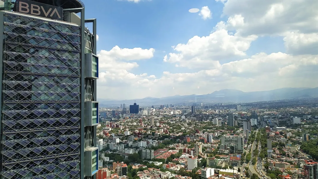 BBVA building under cloudy sky during daytime