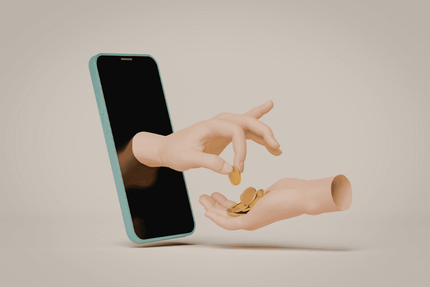Manos transfiriendo dinero desde un teléfono móvil como ejemplo de sobres digitales por objetivos